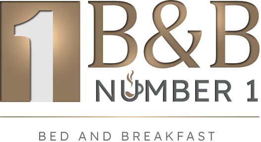 Logo von B&B Number 1 Bad Loipersdorf – Bed and Breakfast in modernem Design mit goldener und weißer Farbgestaltung.