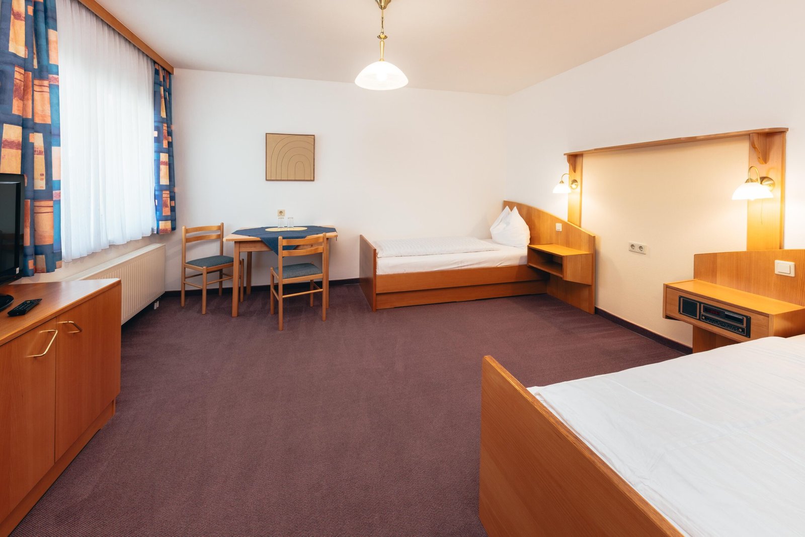 Naturzimmer Bad Loipersdorf | B&B Number 1 Thermenland | Pension Bad Loipersdorf Nähe Therme Loipersdorf B&B Number 1 Helles Familienzimmer im B&B Number 1 Bad Loipersdorf mit Komfortbett, Flachbild-TV und geschmackvoll ausgewähltem Interieur